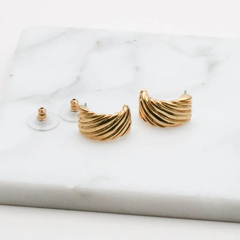 AK gold tone modern earrings