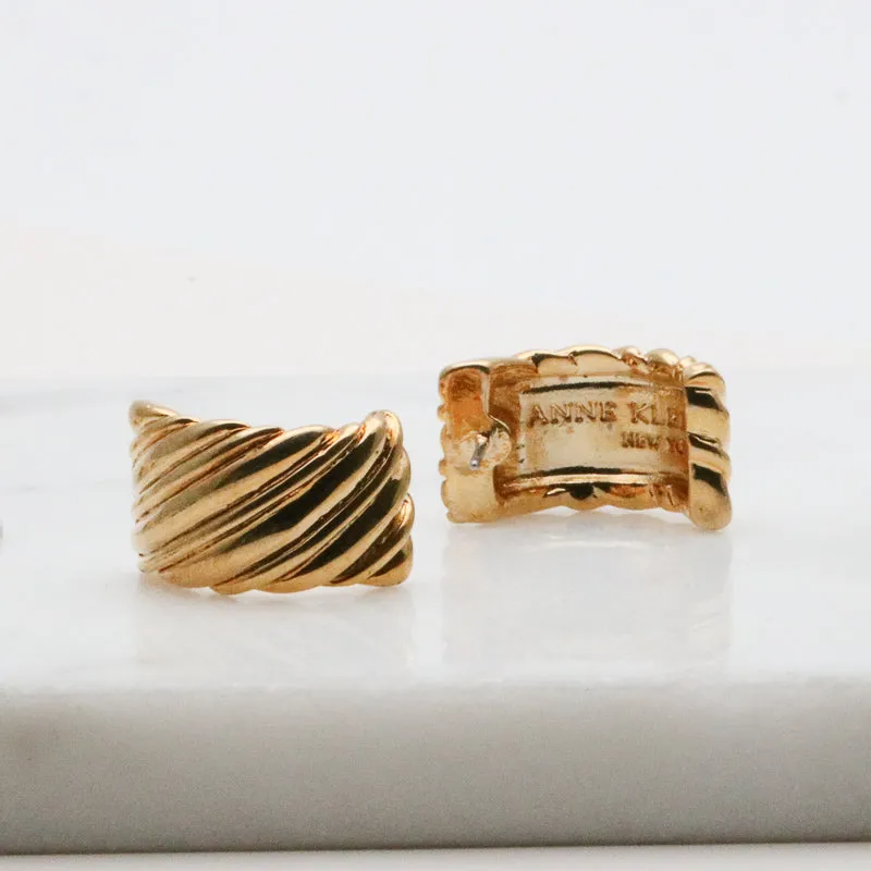 AK gold tone modern earrings