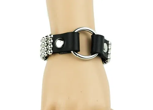 Black leather bracelet w/ 3 rows of silver round studs and o ring