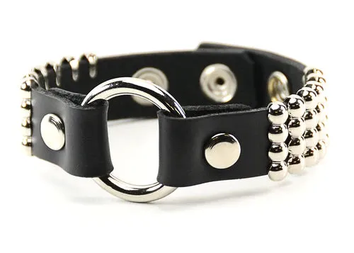 Black leather bracelet w/ 3 rows of silver round studs and o ring