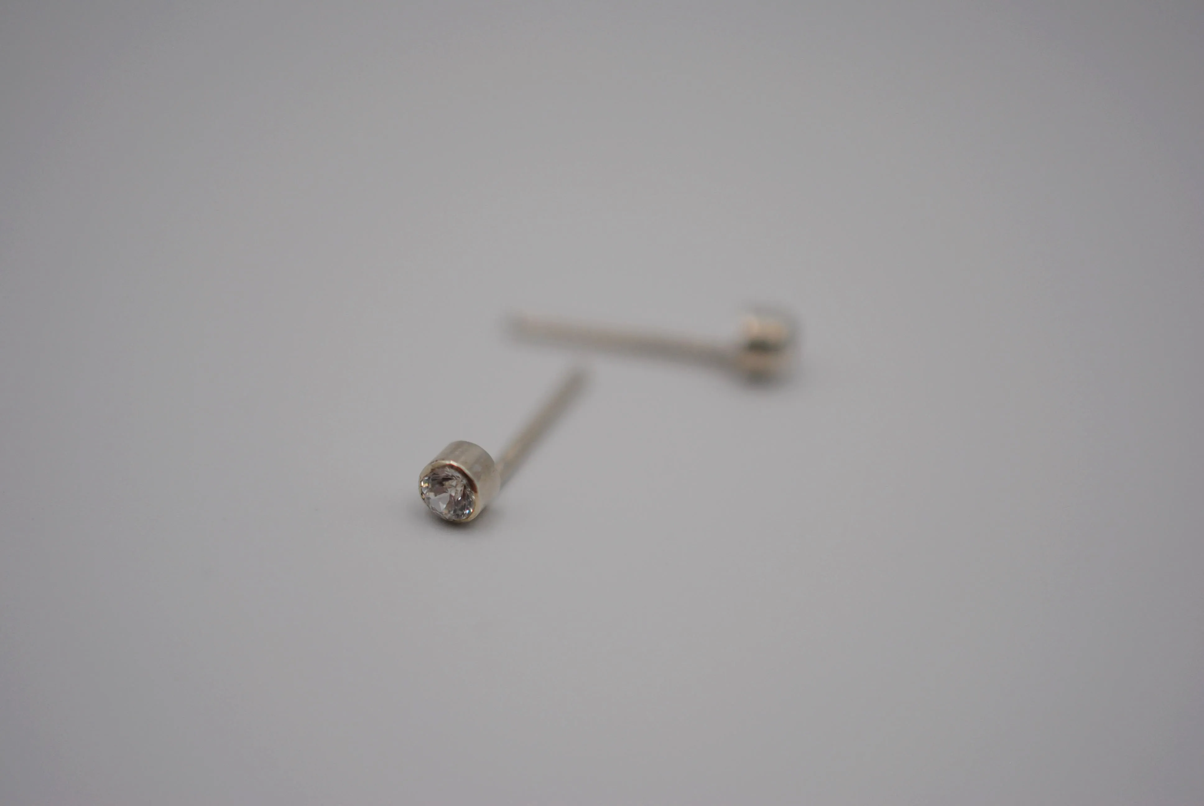 Dainty Post Earrings with Cubic Zirconia in Bezel Setting