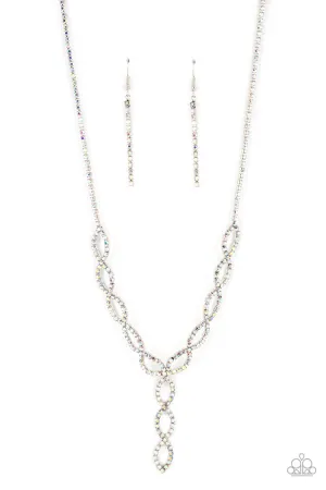 Infinitely Icy - Multi - Iridescent Rhinestone Twisty Y Paparazzi Short Necklace - September 2022 Life of the Party Exclusive