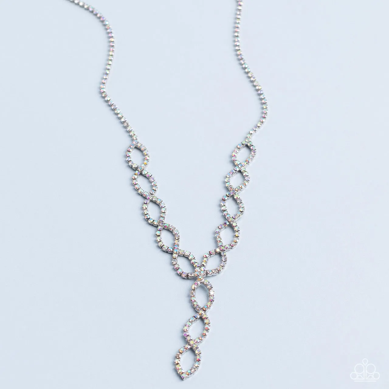 Infinitely Icy - Multi - Iridescent Rhinestone Twisty Y Paparazzi Short Necklace - September 2022 Life of the Party Exclusive