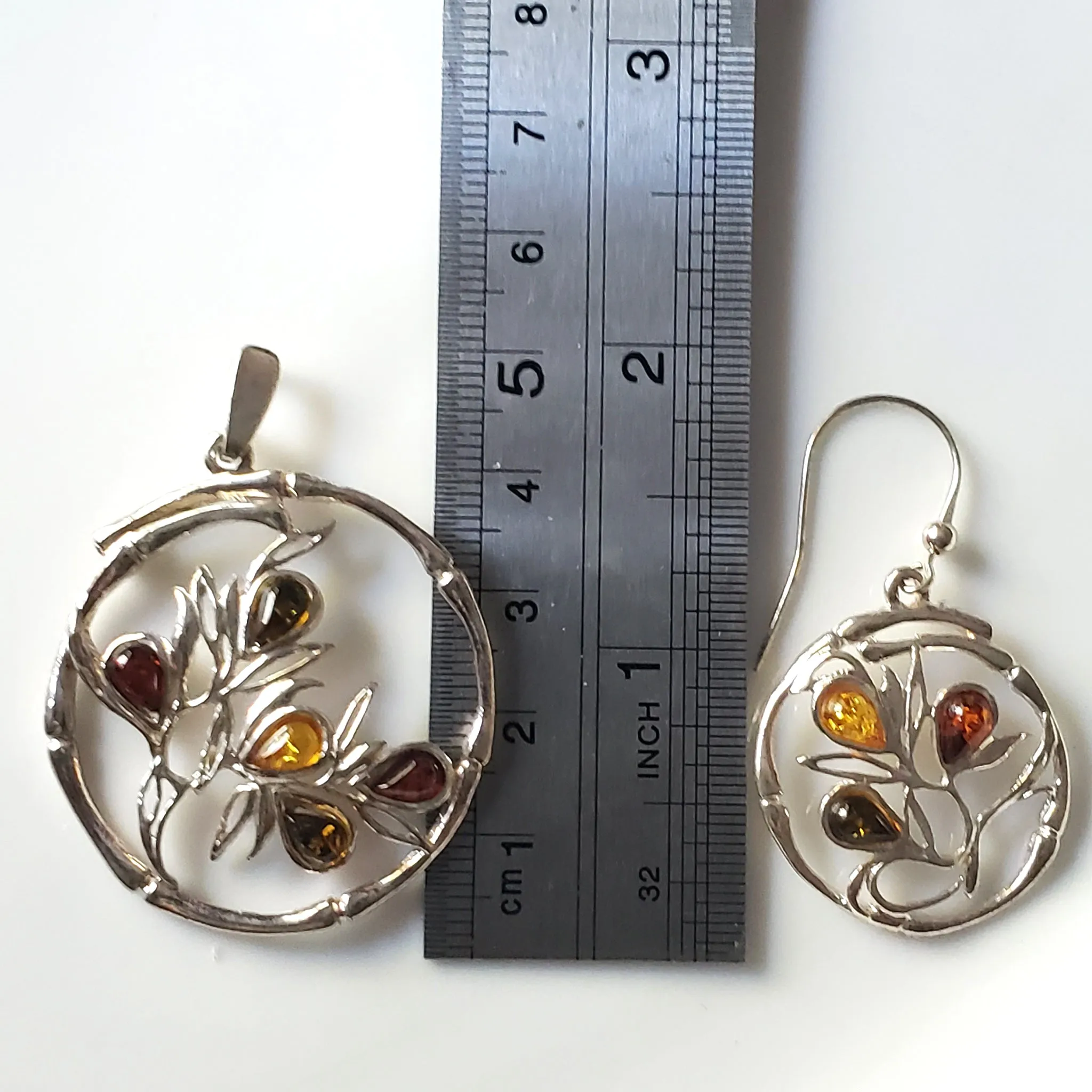 Modern Round Silver Pendant with Flower & Earrings Set
