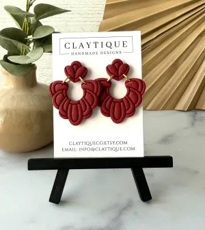 **Ornate Red Embossed Stud Earrings