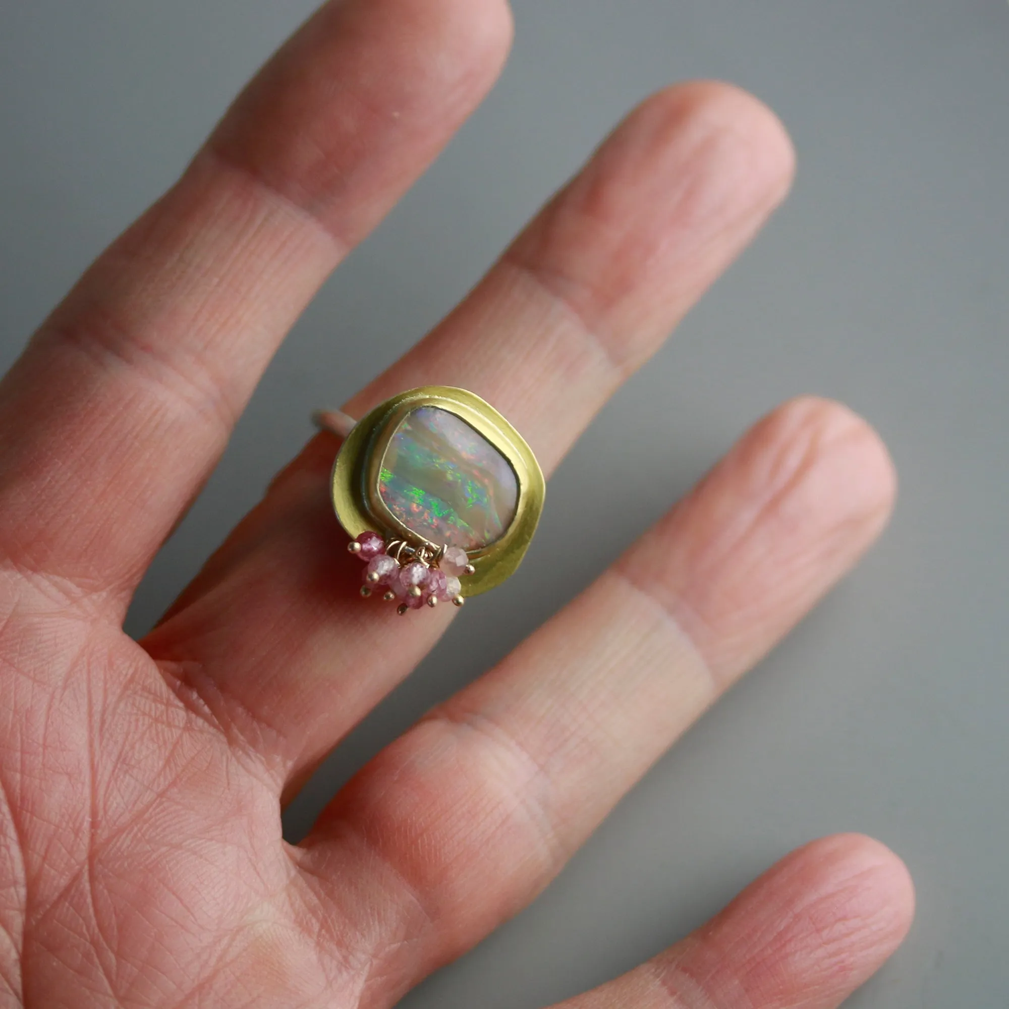 Pastel flash and Caramel Stripes Boulder Opal and Pink Tourmaline Ring. Size 7-7 1/2