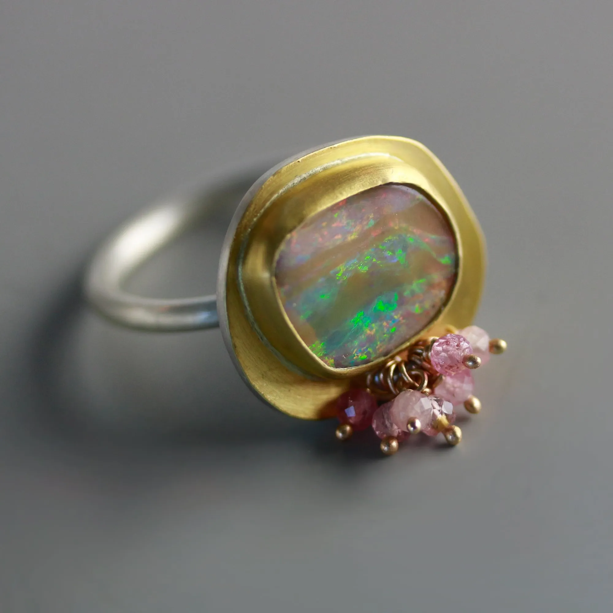 Pastel flash and Caramel Stripes Boulder Opal and Pink Tourmaline Ring. Size 7-7 1/2