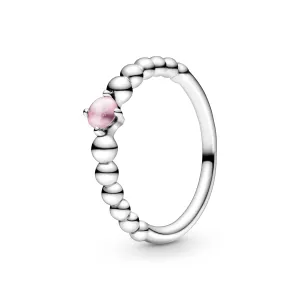 Sterling silver ring with treated petal pink topaz