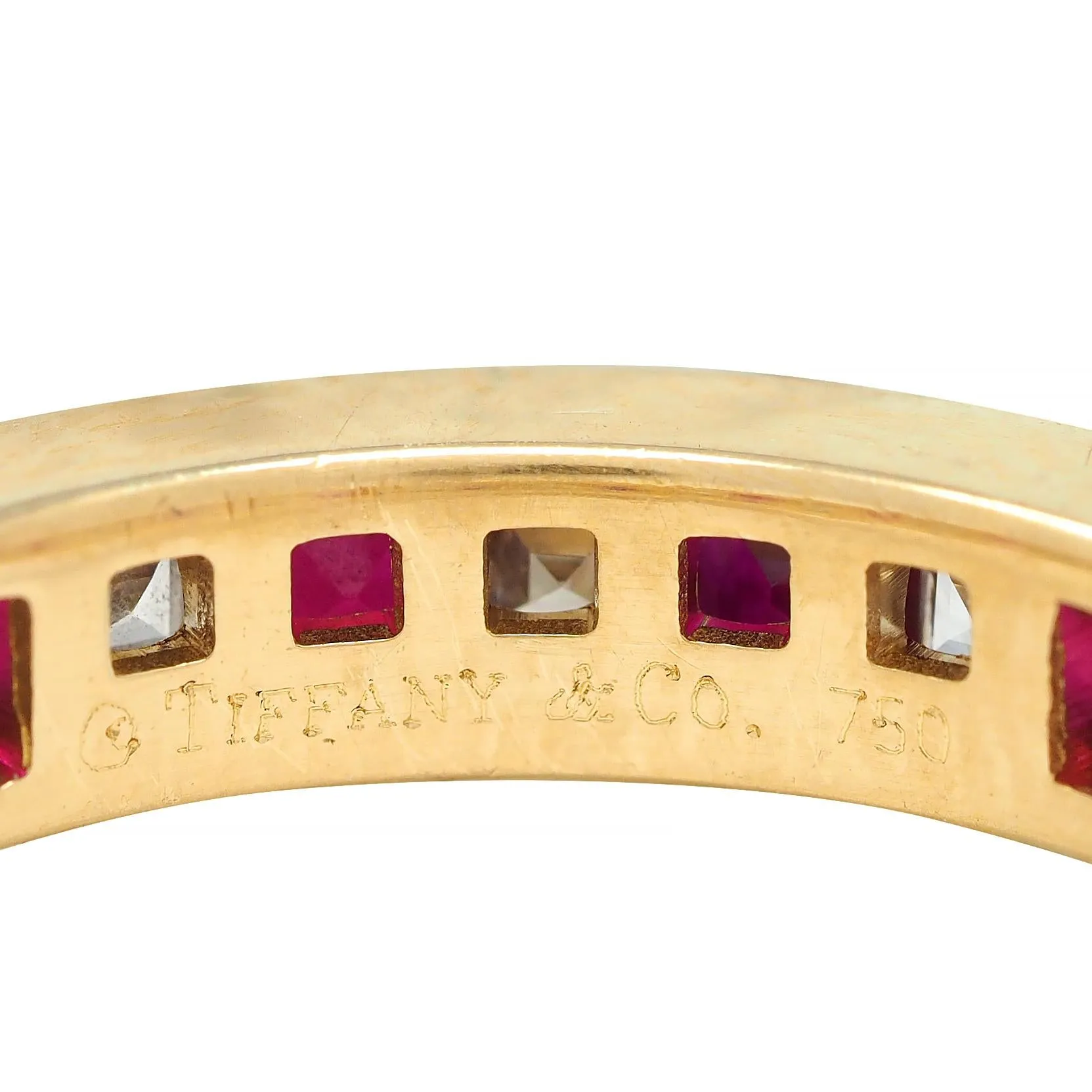 Tiffany & Co. 1.94 CTW Step Cut Diamond Ruby 18 Karat Yellow Gold Vintage Eternity Channel Band Ring