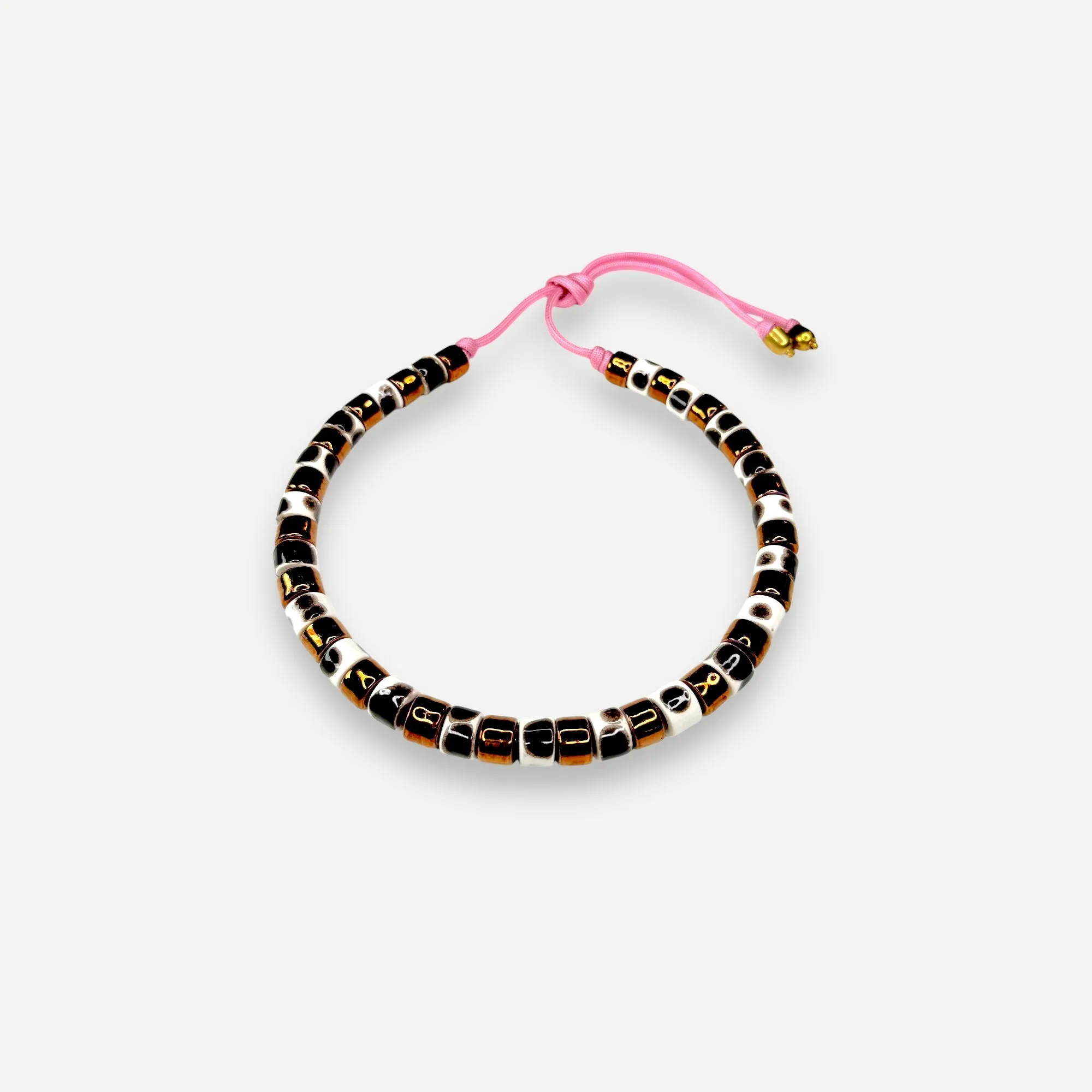 TORT & PENNY CANDY.  BEAD ONE.