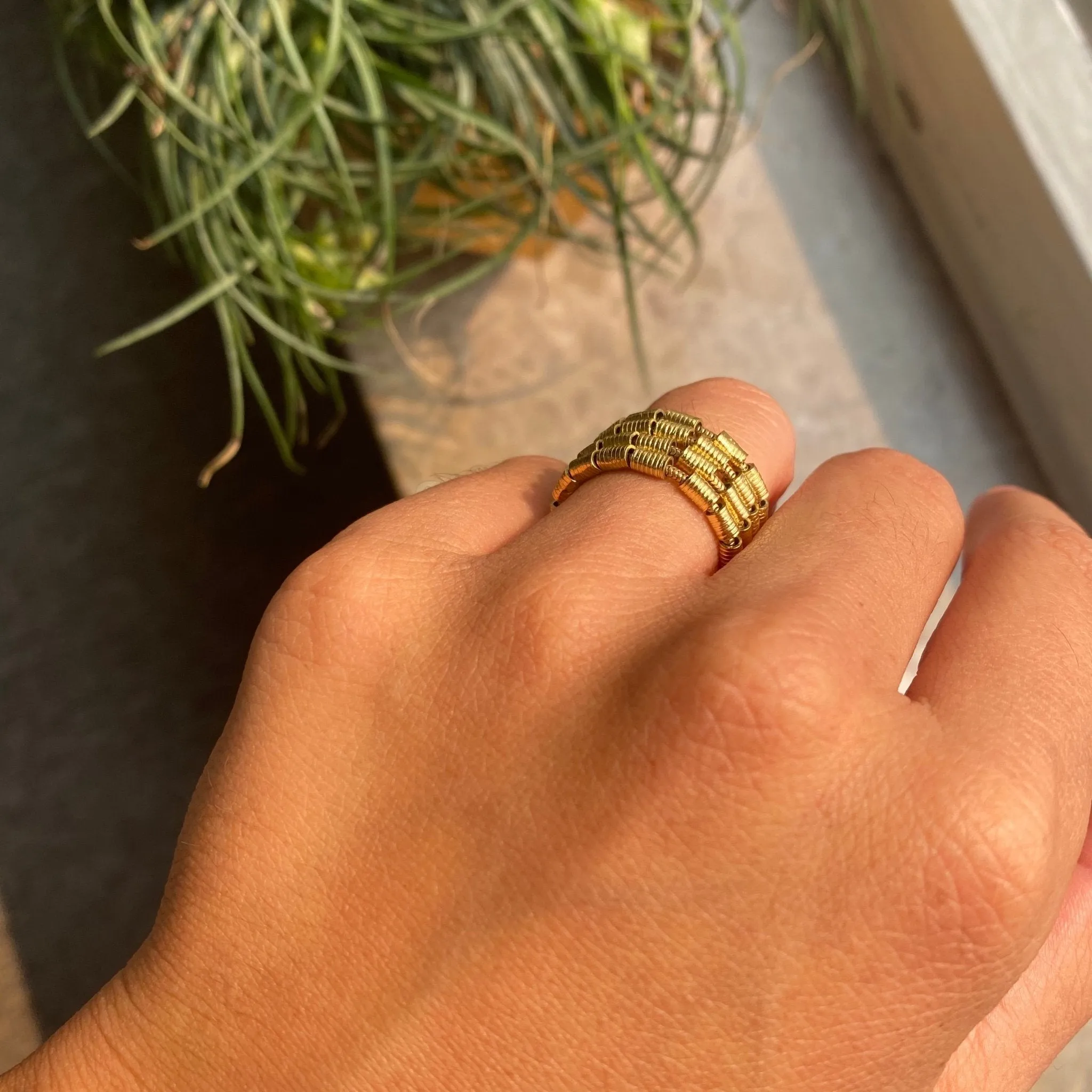 Yellow Gold and Baguette Coil Band