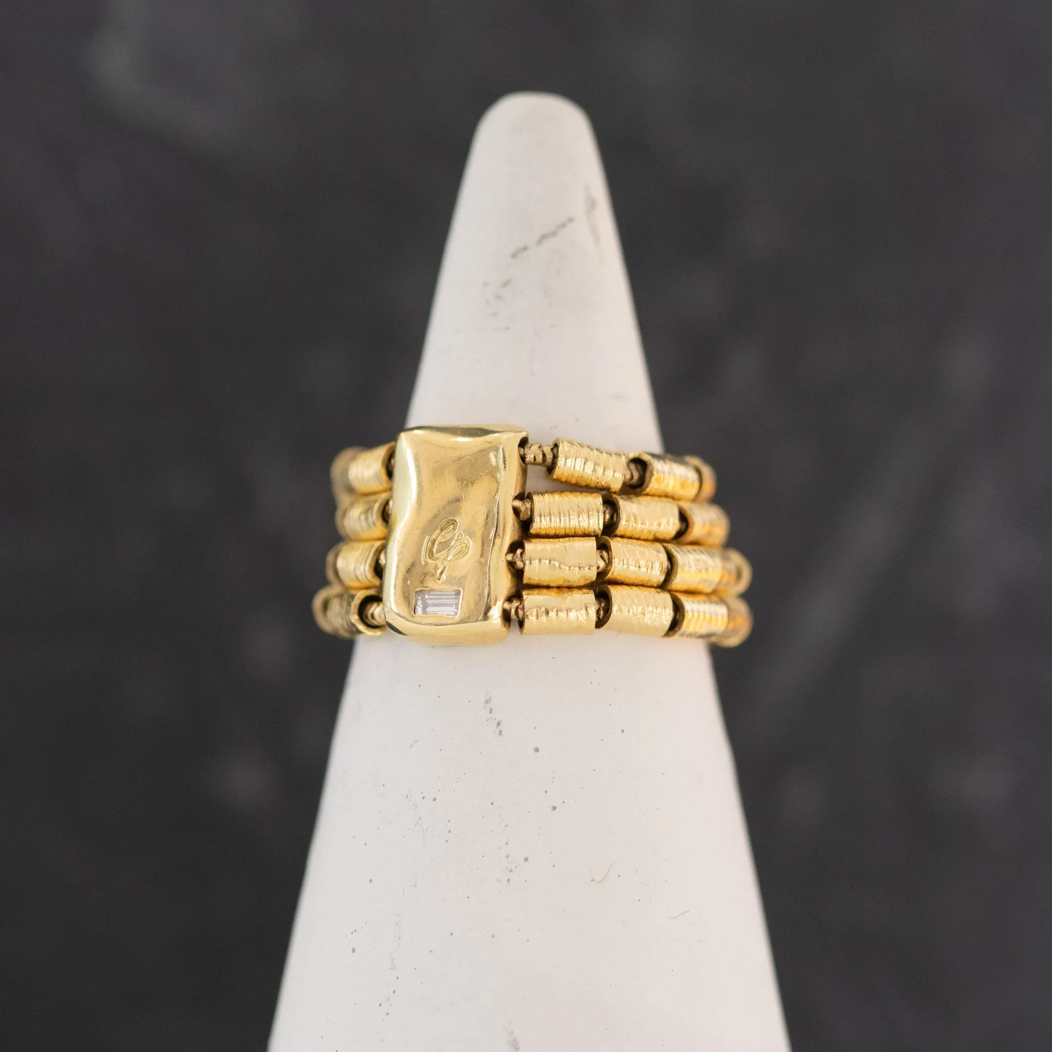 Yellow Gold and Baguette Coil Band