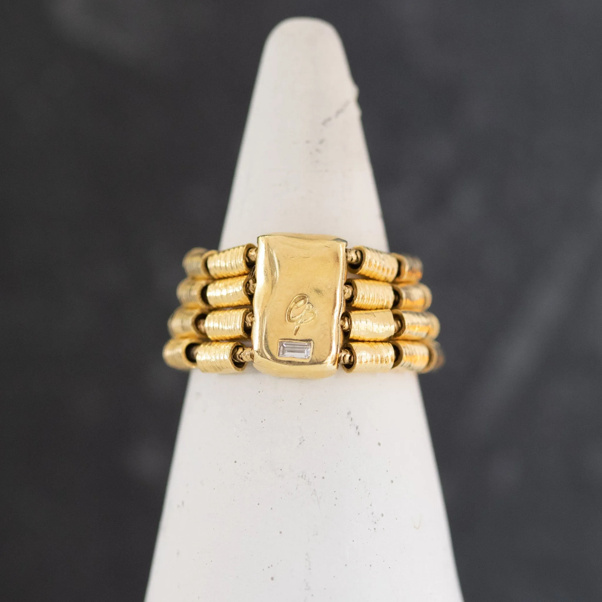 Yellow Gold and Baguette Coil Band