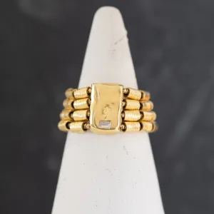 Yellow Gold and Baguette Coil Band