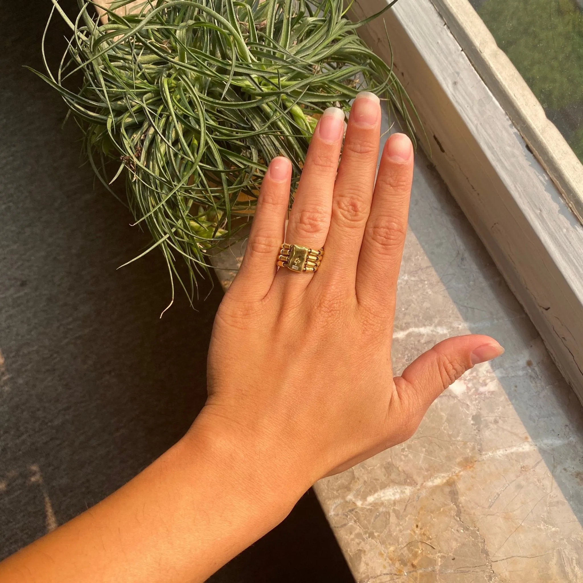 Yellow Gold and Baguette Coil Band